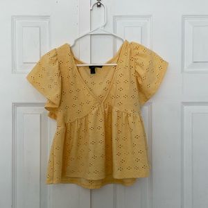 Yellow top, size M in great condition